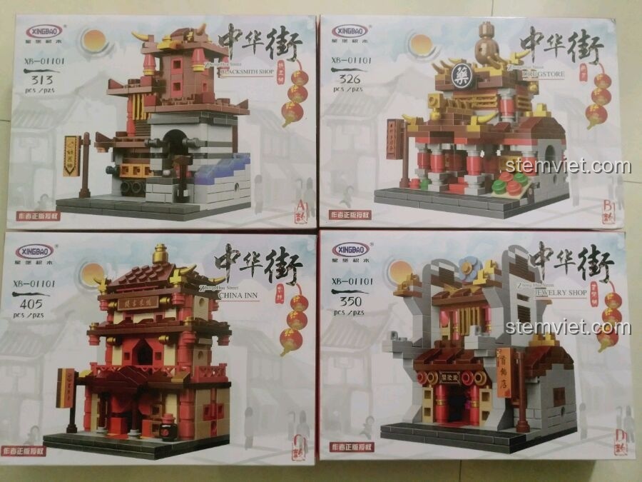 Bốn hộp nhỏ của bộ đồ chơi Hiệu Thuốc Bắc 01101, mỗi hộp là một mô hình kiến trúc khác nhau.