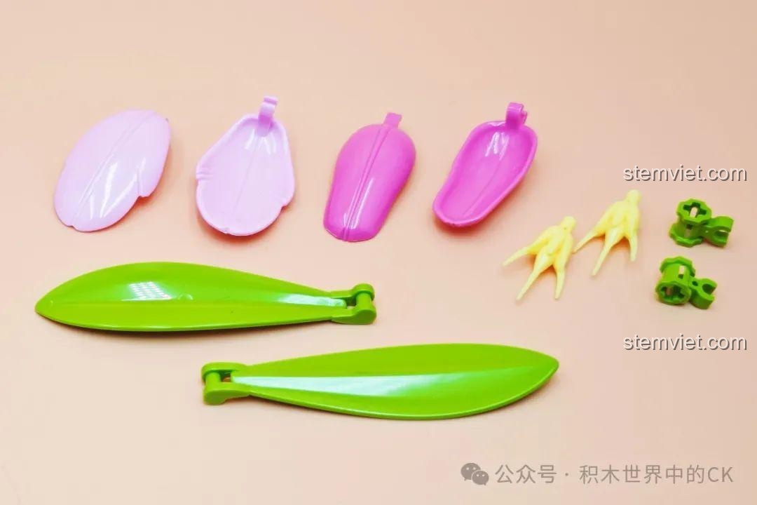 Cận cảnh các chi tiết, mảnh ghép để lắp ráp cánh hoa và lá của bộ đồ chơi hoa BAKA 33802.