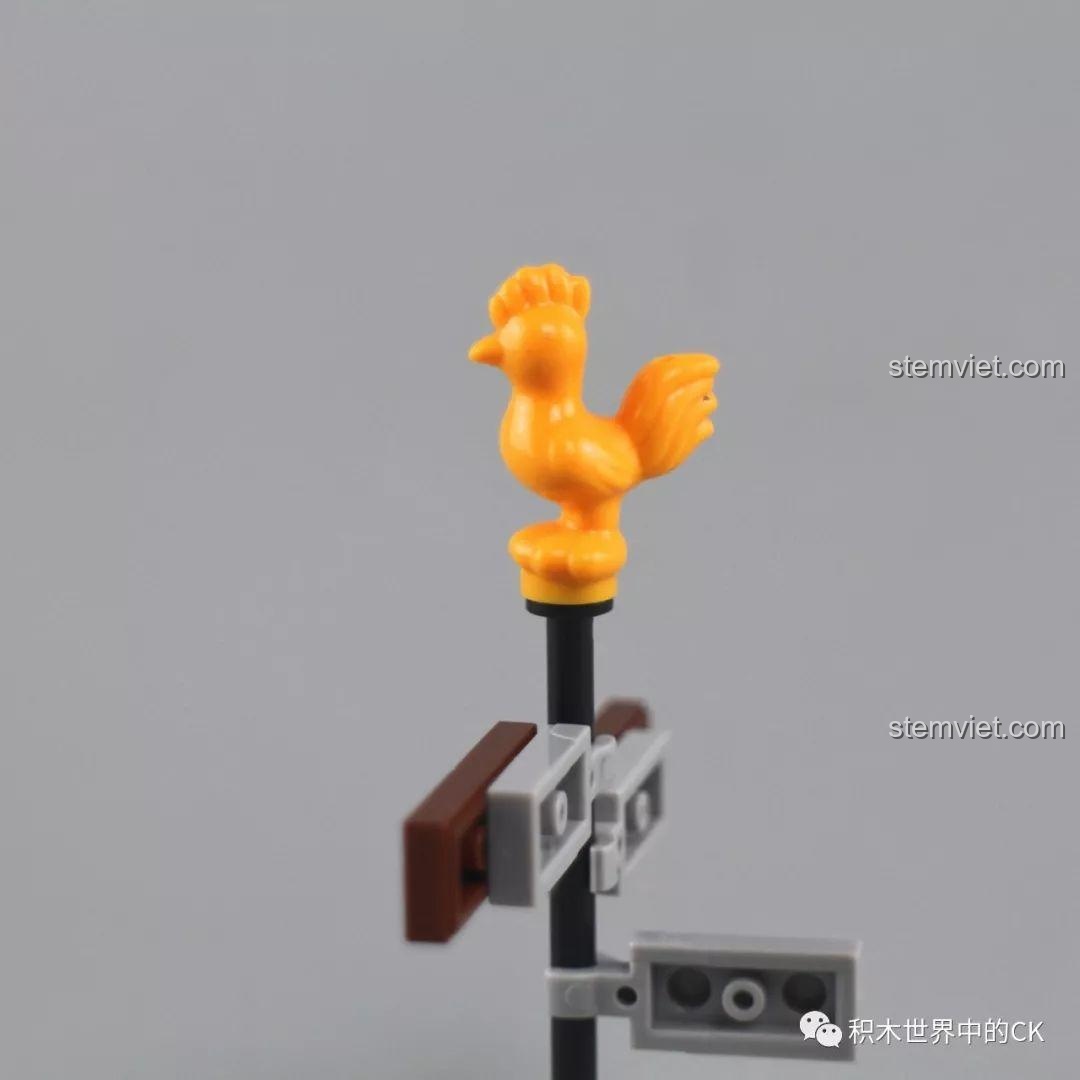 Chi tiết chú gà màu vàng độc đáo trên cột biển báo của bộ lắp ráp Căn Cứ Sinh Tồn Wasteland Winner.