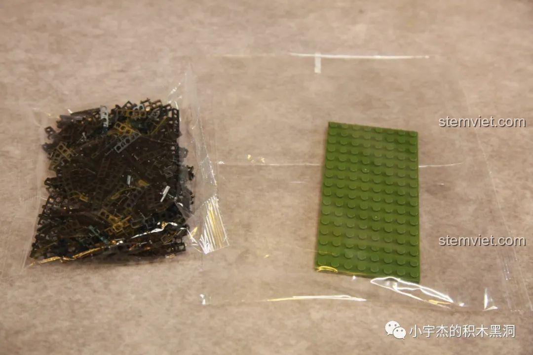 Các chi tiết chung của bộ lắp ghép PGZ-09 688005, bao gồm các mắt xích và tấm nền.