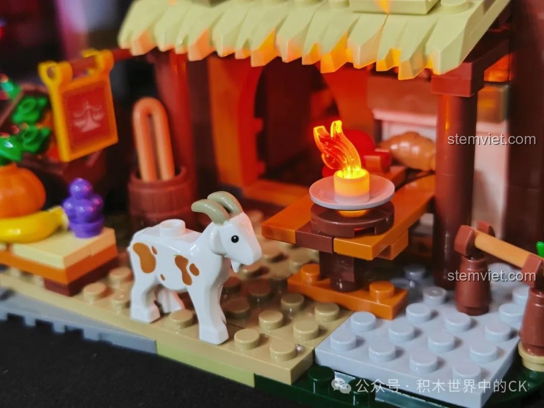 Chi tiết quầy hàng với đèn LED hình ngọn lửa, chú dê và các loại rau củ trong bộ FunWhole F9015.