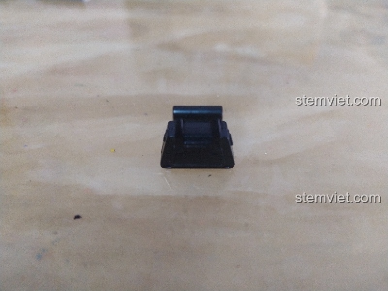 Chi tiết một mảnh ghép hình túi xách màu đen trong bộ đồ chơi xây dựng Sembo Block SD6026.
