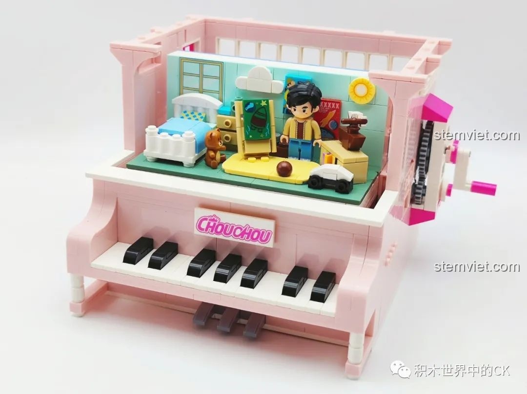 Cơ chế bánh răng và tay quay của bộ đàn piano xoay Keeppley DZ0155.