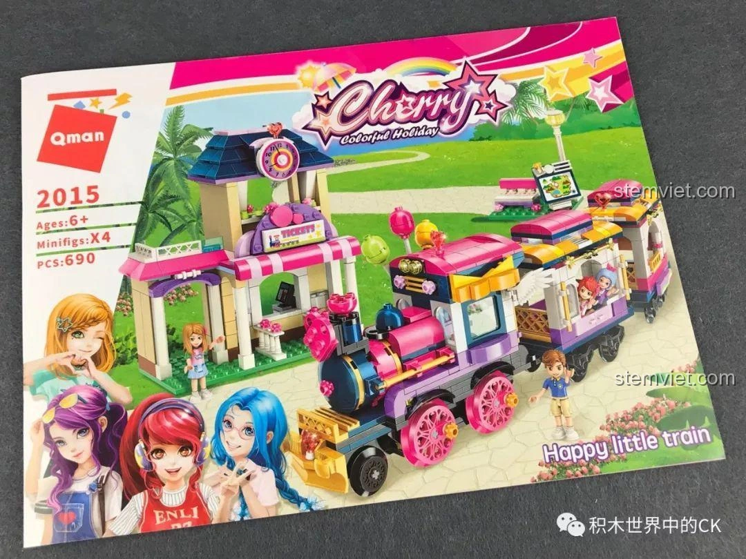 Sách hướng dẫn lắp ráp của bộ xếp hình Tàu Hỏa Vui Nhộn Kỳ Nghỉ Đầy Màu Sắc Qman 2015.