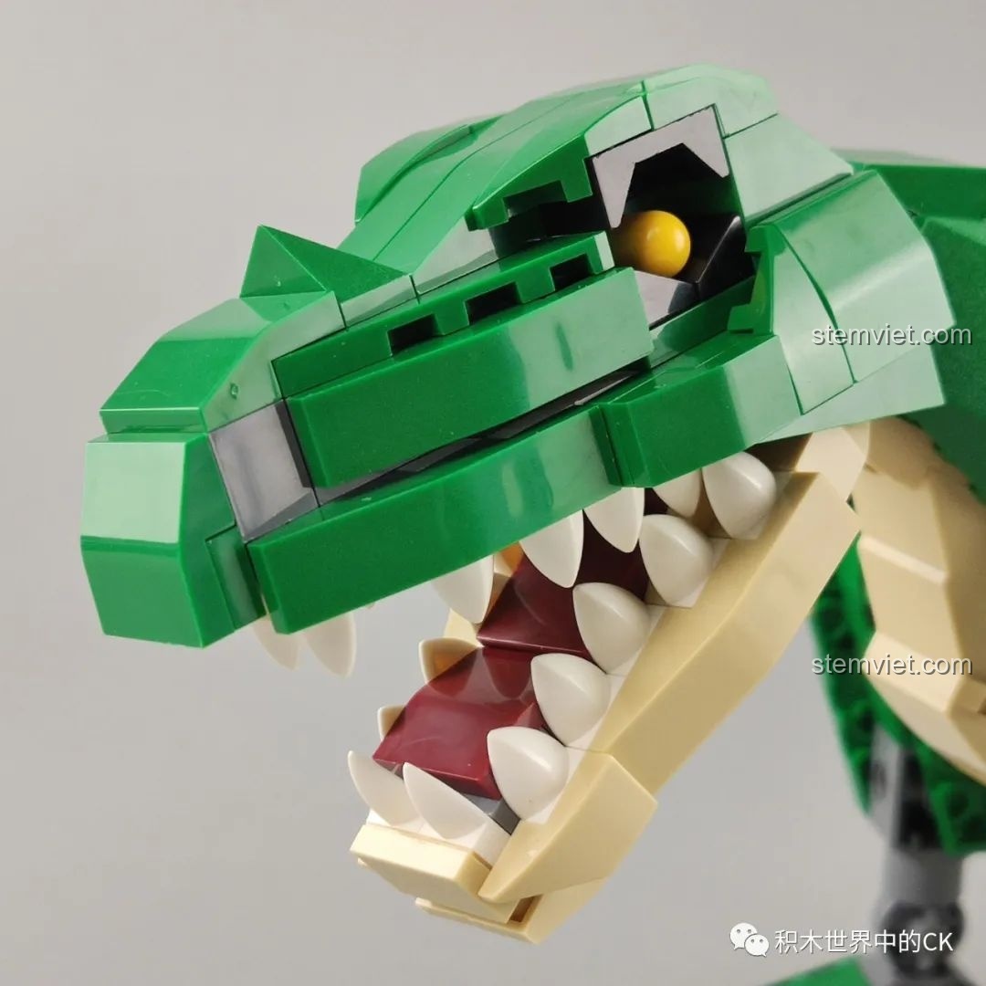 Cận cảnh phần đầu của mô hình T-Rex GUDI 50102, chi tiết mắt và hàm răng sắc nhọn.