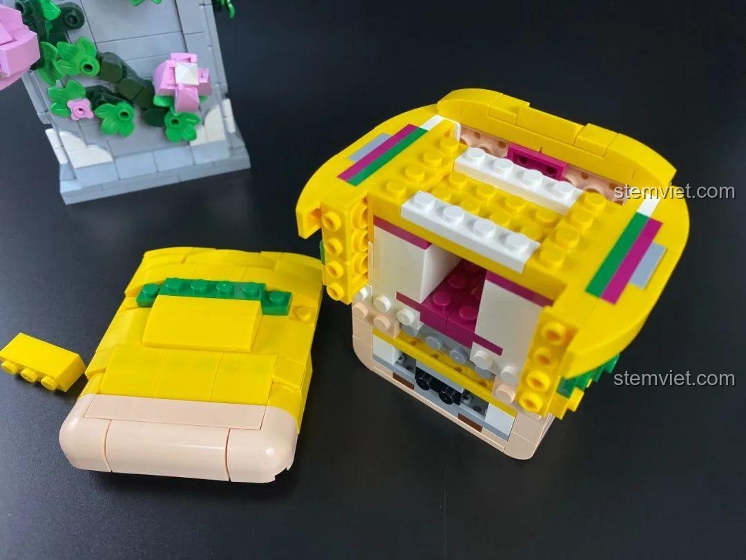 Cận cảnh phần lưng của Tượng Thần Tình Yêu Cupid 846681, với hai lỗ hình chữ thập màu xanh để gắn vào bệ hoặc đứng.