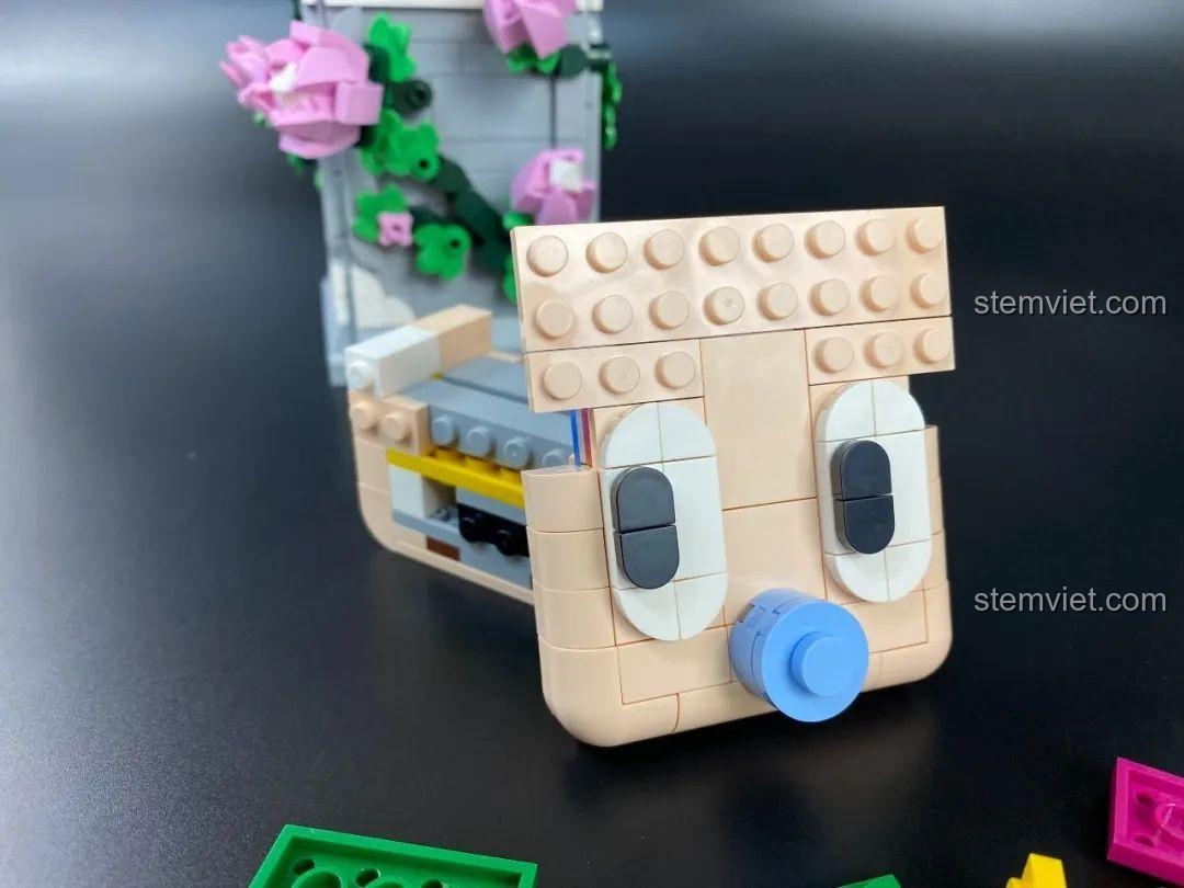 Tượng Thần Tình Yêu Cupid DOKI 846681 đang trong tư thế nhắm bắn cung, thể hiện sự tập trung và đáng yêu.