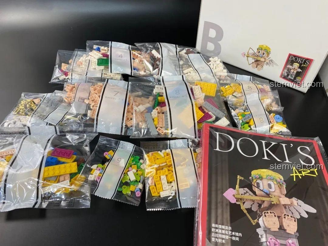 Các túi mảnh ghép được đánh số từ hộp B và sách hướng dẫn của đồ chơi xếp hình Tượng Thần Tình Yêu Cupid DOKI.