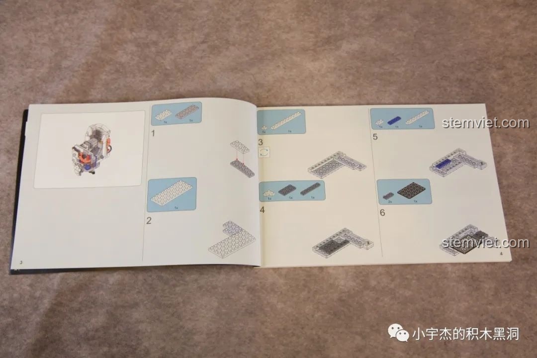 Hướng dẫn lắp ráp kiểu phân biệt màu xám trong sách của bộ JAKI JK9106, đòi hỏi sự tập trung.