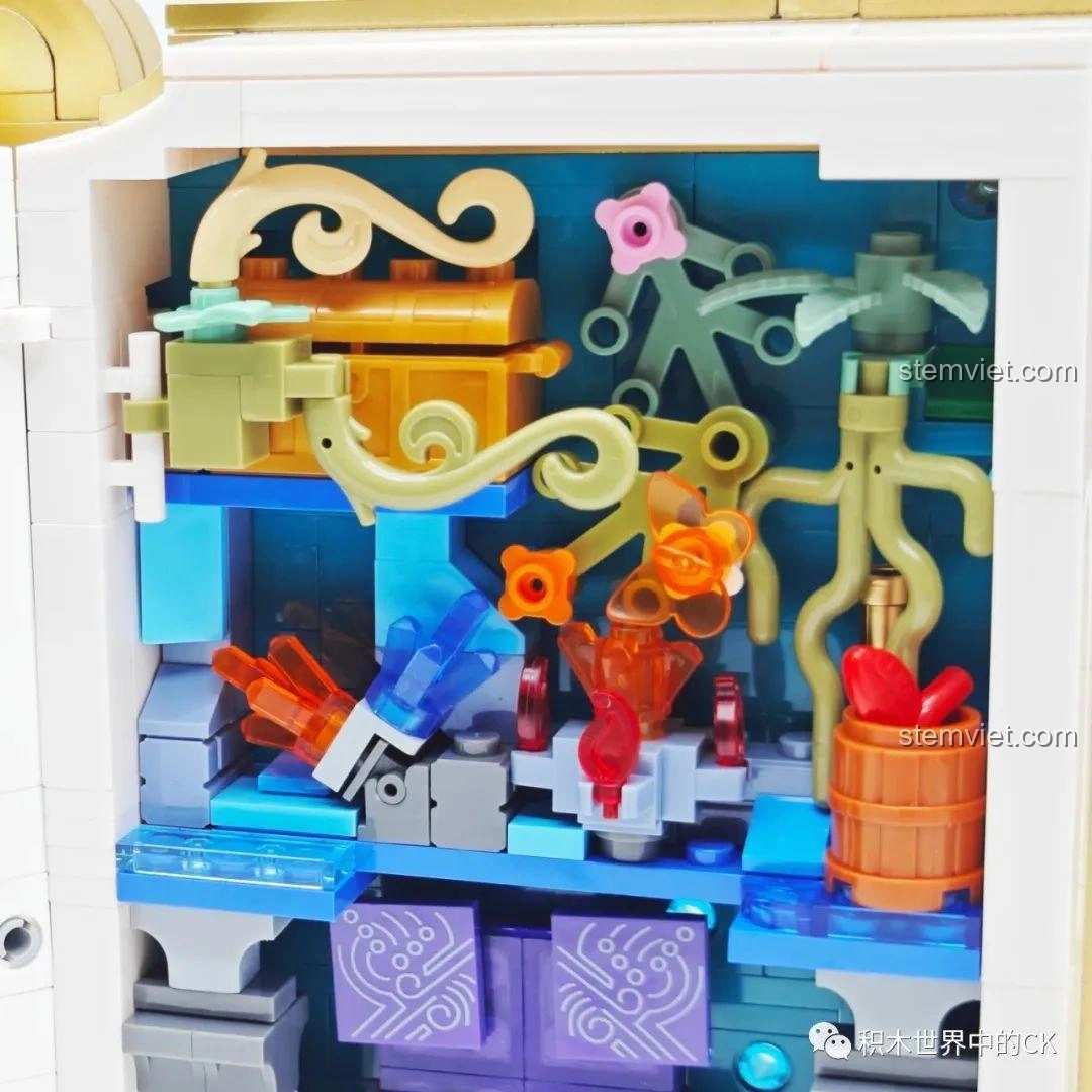 Mô hình JIESTAR 58102 Sách Thiên Không được trưng bày cùng các nhân vật Genshin Impact, tạo cảnh quan sống động.