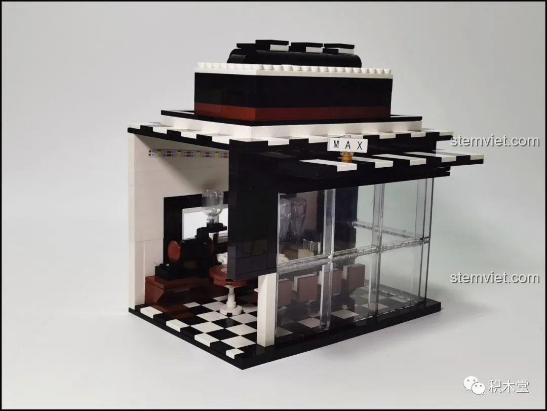 Tầng cuối cùng của bộ lắp ghép Juhang Technology 86007 Quán Cà Phê Góc Phố, với sàn được phủ hoàn toàn bằng gạch bóng, tạo cảm giác sang trọng và hoàn thiện.