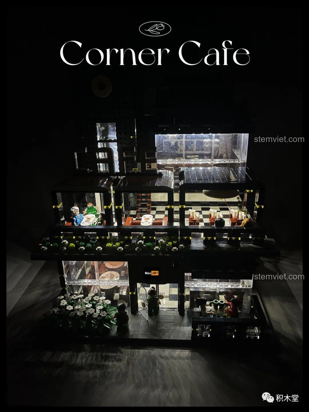 Hiệu ứng đèn LED của bộ lắp ghép Juhang Technology 86007 Quán Cà Phê Góc Phố vào ban đêm, tạo không khí ấm cúng và lãng mạn cho mô hình.