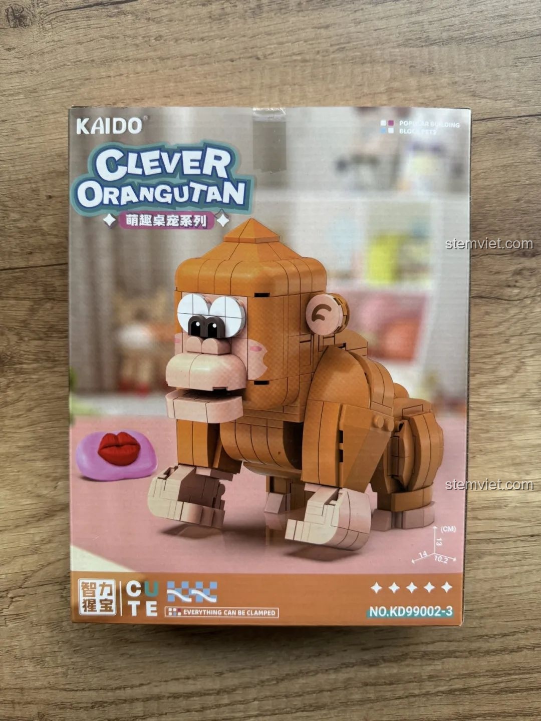 Hộp đồ chơi lắp ráp Kaido KD99002-3 Thú Cưng Để Bàn: Đười Ươi Thông Minh với hình ảnh sản phẩm và thông tin độ tuổi 8+.