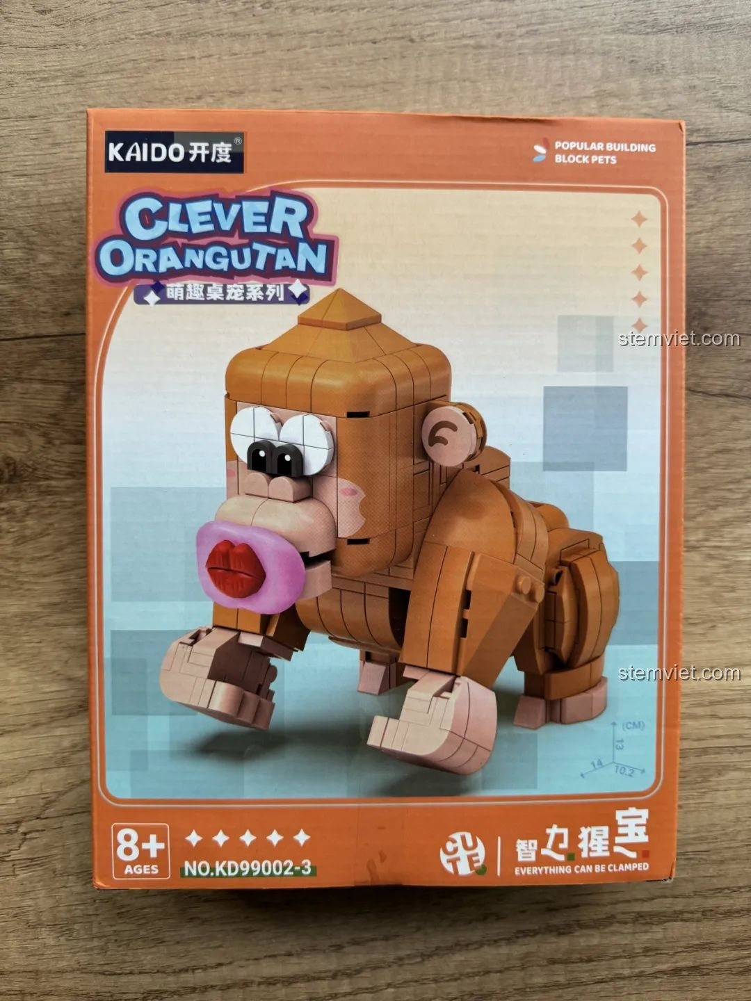 Hộp đồ chơi lắp ráp Kaido KD99002-3 Thú Cưng Để Bàn: Đười Ươi Thông Minh với hình ảnh sản phẩm và thông tin độ tuổi 8+.