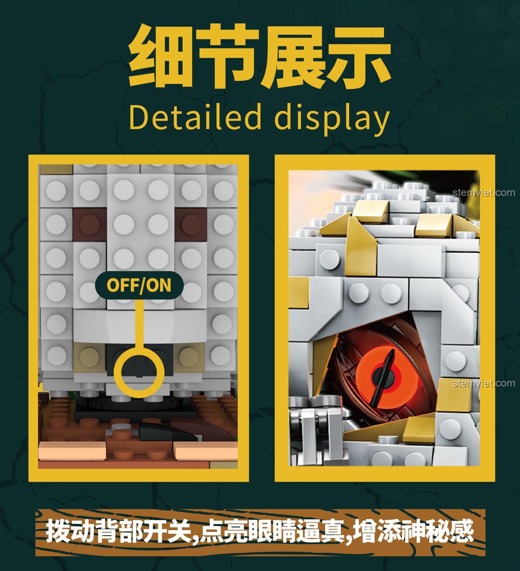 Chi tiết công tắc đèn LED và mắt phát sáng của mô hình trứng khủng long Velociraptor.