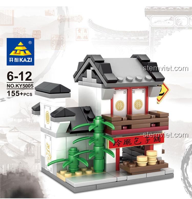 Thông tin chi tiết trên hộp bộ xếp hình Khách Sạn Tề Lỗ KAZI 5005, bao gồm kích thước và số lượng 140 mảnh ghép.