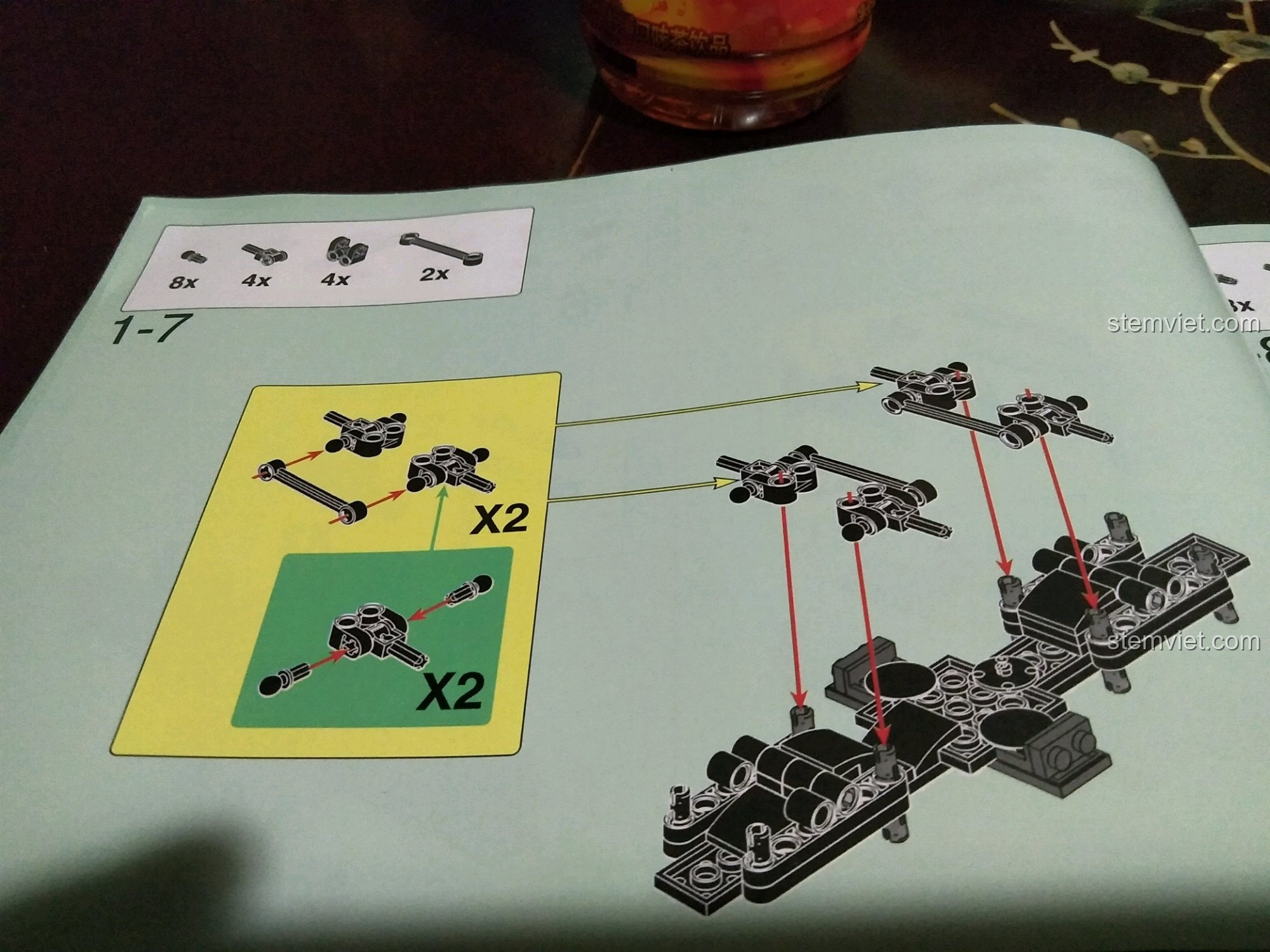 Chi tiết các bước lắp ráp trục và khớp nối cho hệ thống treo 8 bánh của xe Xingbao XB-03027.