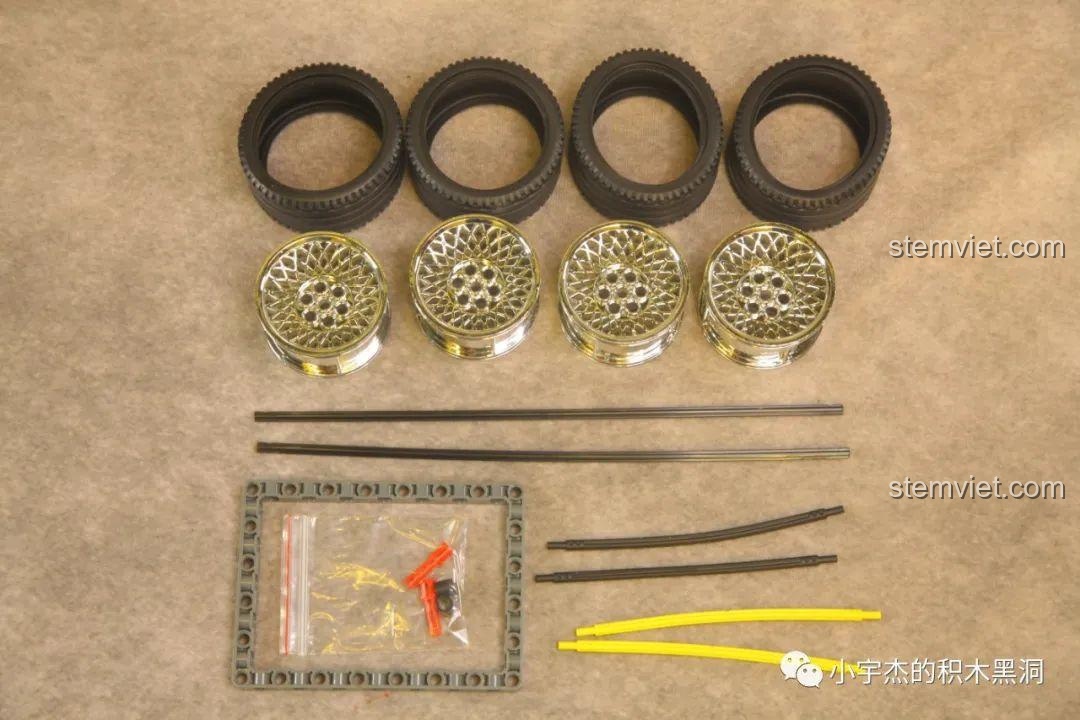 Các chi tiết chính của bộ K Box 10249 Toyota Supra bao gồm 4 bánh xe, trục và vành mạ điện.