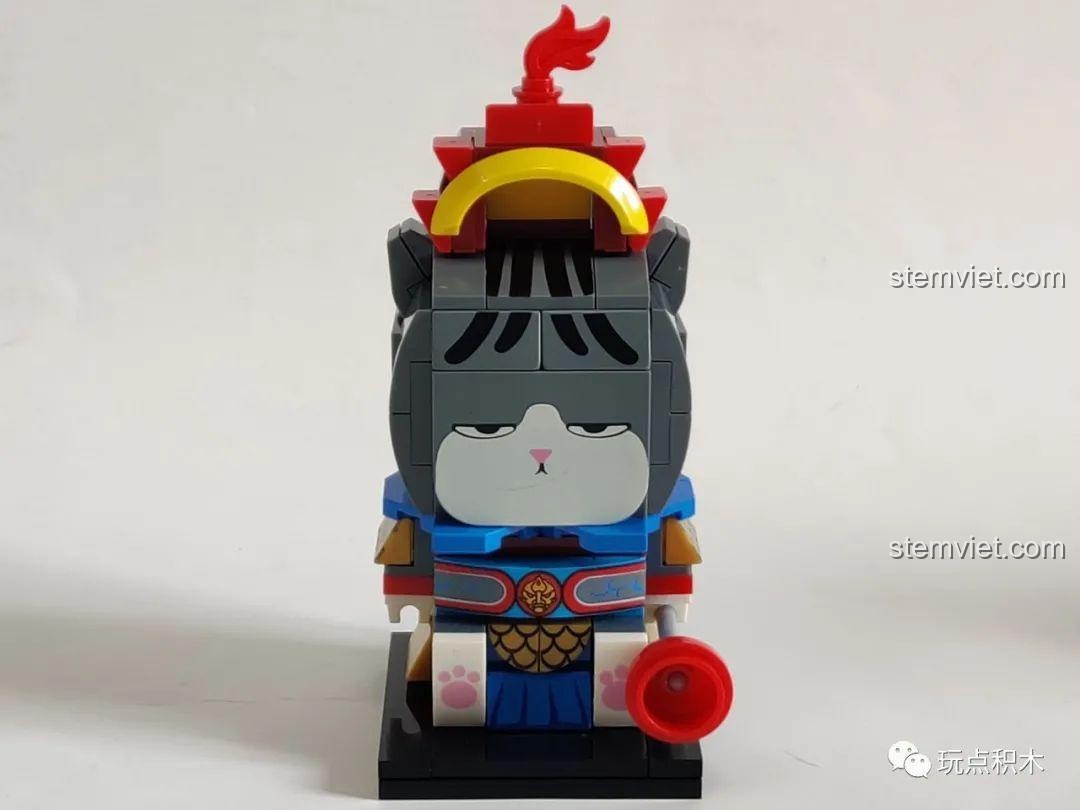 Các mảnh ghép in hình khuôn mặt, chân chó và các chi tiết trang trí của mô hình GUDI 52054.