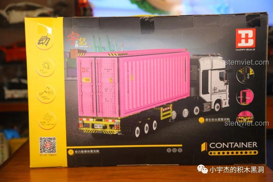 Mặt trước hộp đồ chơi lắp ráp Thùng Container Hồng 1:10 YC-QC013 của Happy Build, hiển thị mô hình container và xe đầu kéo.