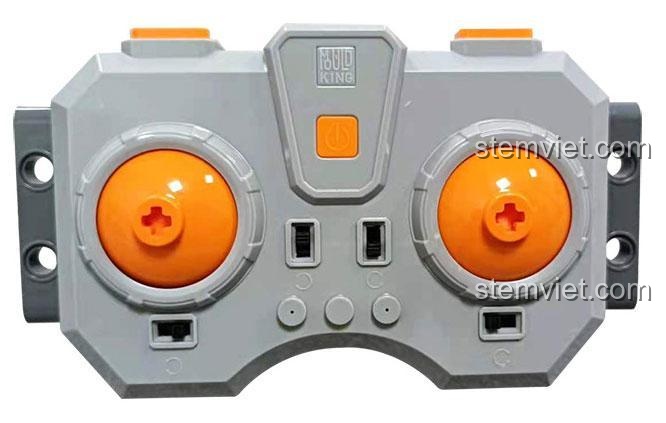 Cận cảnh tay cầm điều khiển từ xa của bộ Mould King M0019, thiết kế công thái học cho người chơi.