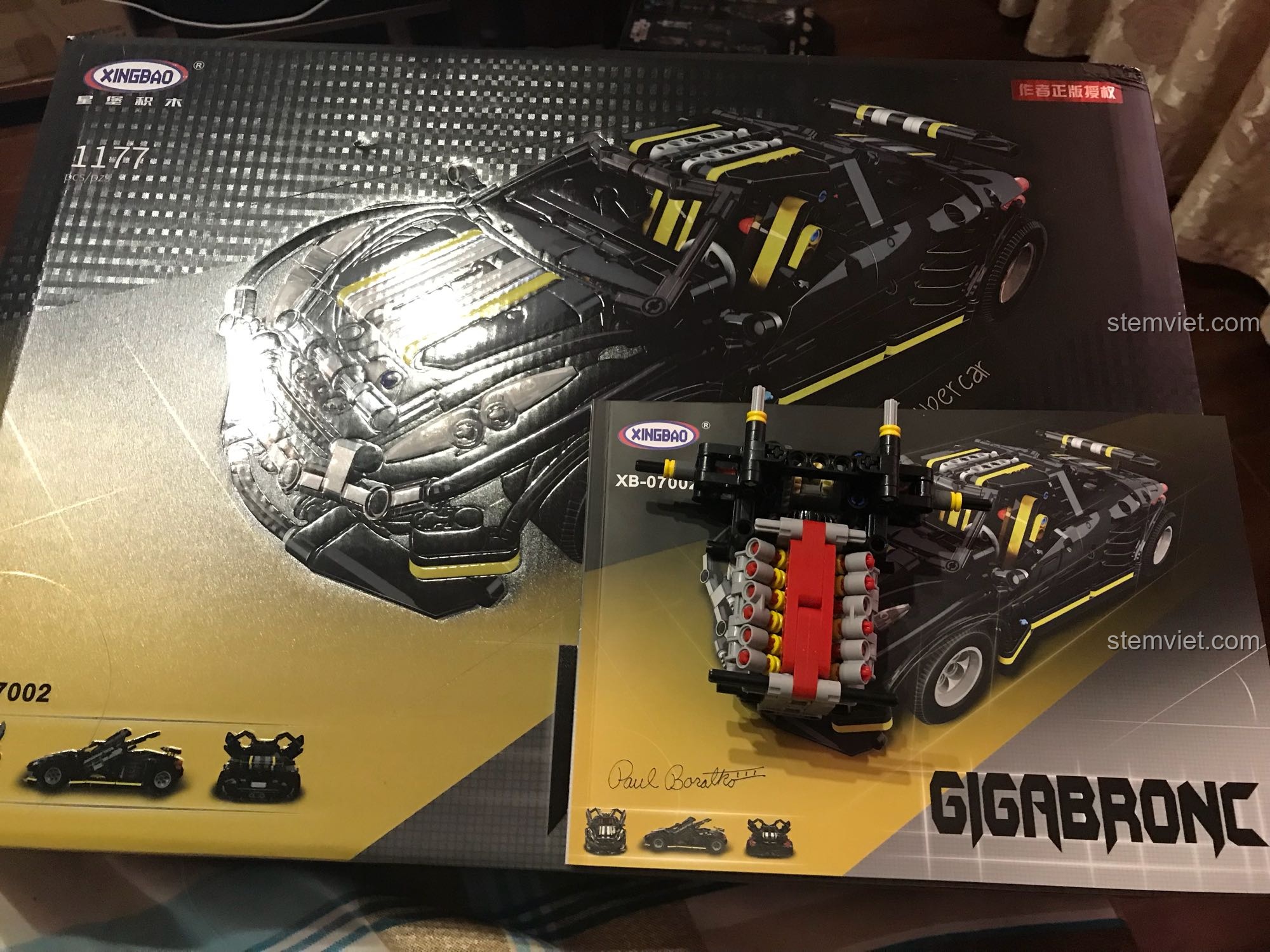Toàn cảnh hộp sản phẩm và sách hướng dẫn trong bài nhận xét XINGBAO XB-07002 Xe đua Balisong.