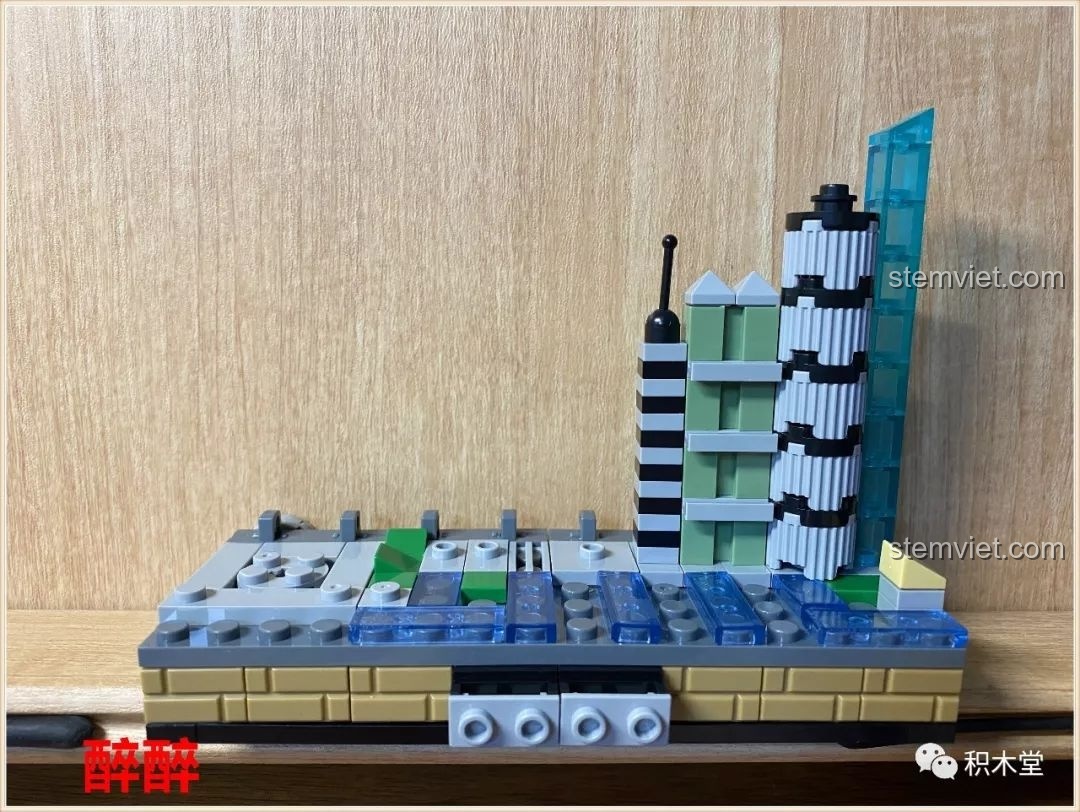 Những tòa nhà cao tầng và Tháp Quảng Châu dần hiện rõ trong quá trình lắp ráp đồ chơi PanlosBrick Thành phố thu nhỏ Quảng Châu.