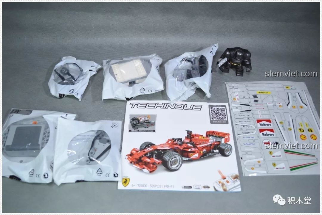 Toàn bộ chi tiết bộ lắp ráp Mô hình Ferrari F1 RC FRR-F1 xịn giá rẻ, bao gồm động cơ và sticker.