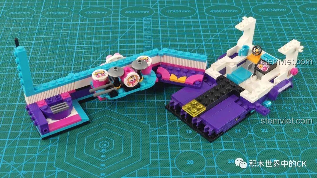 Quá trình lắp ghép bộ QMAN 2031 Xe Buýt Sân Khấu Biến Hình Độc Đáo, đồ chơi mô hình nhạc hội sôi động.