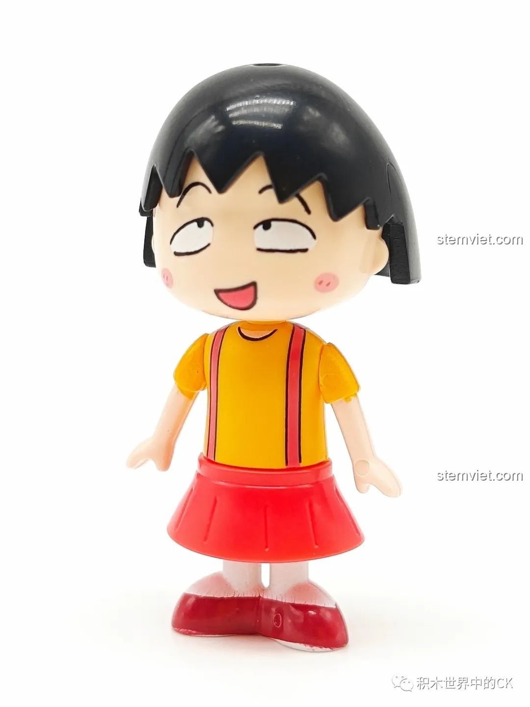 Cận cảnh nhân vật Maruko trong bộ lắp ghép Wekki 516413 Phòng khách của Maruko, với biểu cảm hài hước.