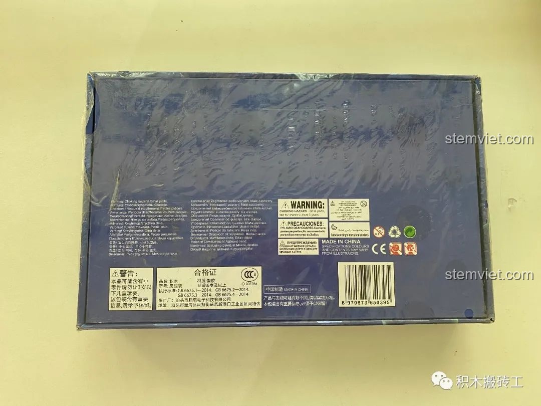 Mặt sau hộp bộ lắp ghép Mô hình rồng cute XB11001 với các thông tin chi tiết và chứng nhận an toàn.