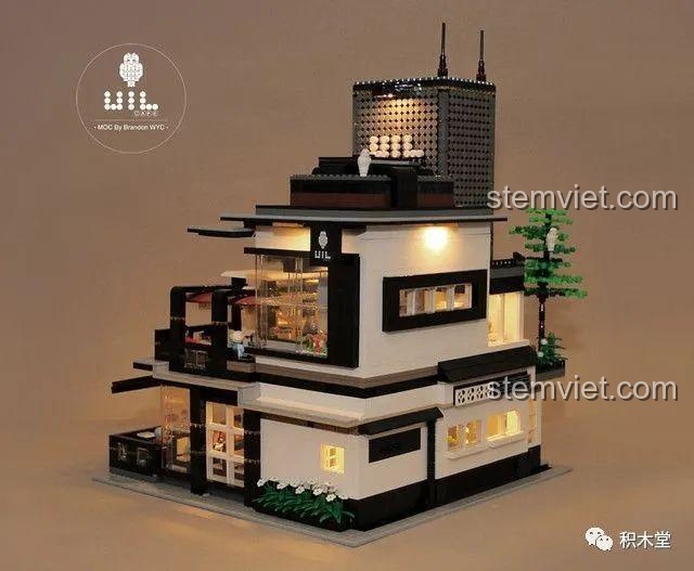 Mô hình quán cà phê góc phố Juhang 86007 đã hoàn thiện với đèn LED sáng lung linh, tạo không gian ấm cúng và hiện đại.