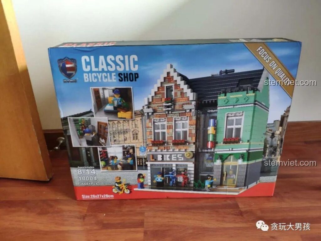 Hình ảnh vỏ hộp mặt trước của bộ đồ chơi Leier 10004 Cửa hàng xe đạp, một mô hình kiến trúc châu Âu cổ điển.