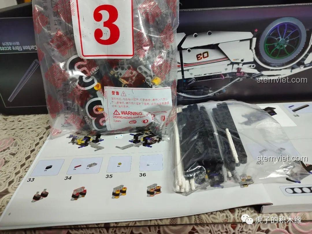 Trang hướng dẫn Mould King 13145 McLaren 720S chỉ ra vị trí của dây cao su cần dùng trong bước 36. Đồ chơi xây dựng 45 chất lượng cao giá tốt.