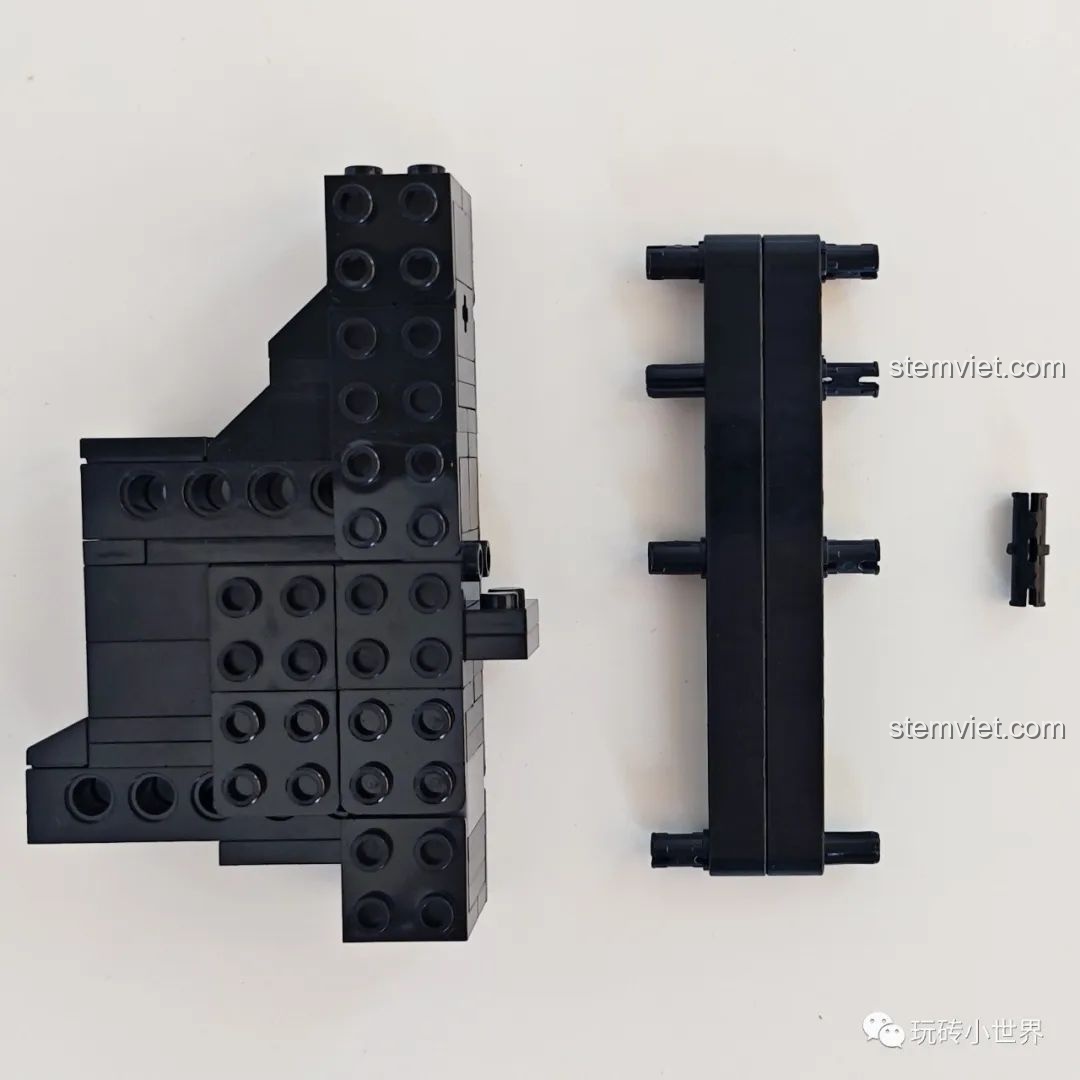 Các mảnh ghép cơ bản của bộ Qizhile 103001 Thỏ Cát Lợi đang được lắp ráp, tạo khung xương ban đầu, đồ chơi xếp hình Mô Thỏ 1.