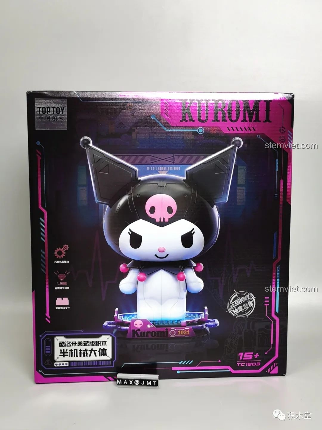 Mặt trước hộp sản phẩm bộ lắp ghép Kuromi bán cơ khí TOP TOY TC1803, hiển thị hình ảnh mô hình màu đặc và các tính năng chính.