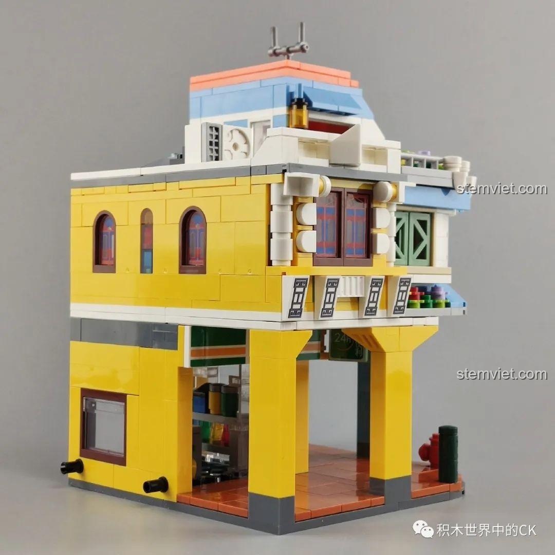 Góc nhìn khác của dãy phố kết hợp từ WOMA C0338 và C0339 Khu Phố Cổ Qilou, thể hiện sự hài hòa giữa hai phong cách kiến trúc. Mô hình thành phố.