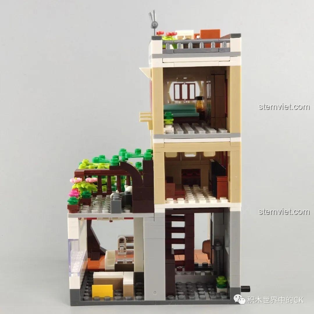 Mô hình cắt ngang của WOMA C0338 Khu Phố Cổ Qilou, hiển thị không gian nội thất bên trong các tầng. Thiết kế nội thất.