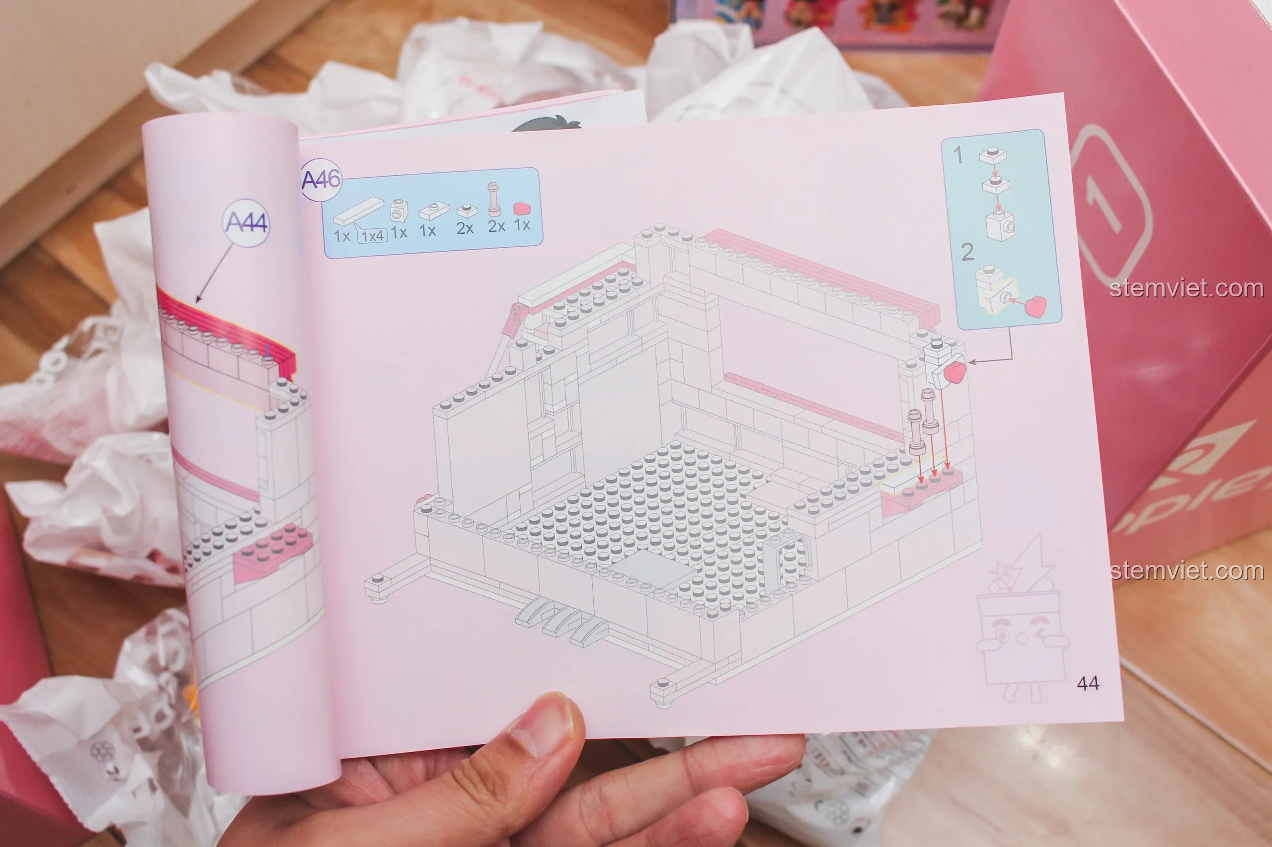 Cận cảnh một trang trong sách hướng dẫn lắp ráp của bộ Keeppley DZ0155, hình ảnh 3D rõ ràng, dễ hiểu.