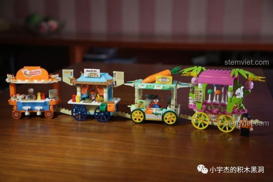 Bộ sưu tập 4 xe bán hàng rong mini Sembo 601115 được nối lại với nhau thành một đoàn tàu vui nhộn.