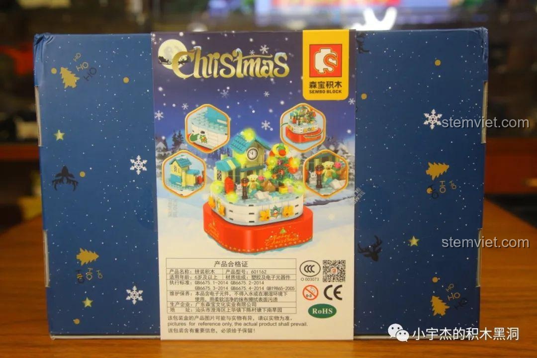 Mặt sau hộp của Hộp nhạc Người tuyết 601162, mô tả các bước lắp ráp và các chi tiết của mô hình.