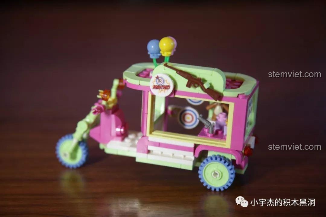 Mô hình Xe trò chơi bắn súng Sembo 601207 màu hồng và xanh pastel, món quà đáng yêu cho con gái.