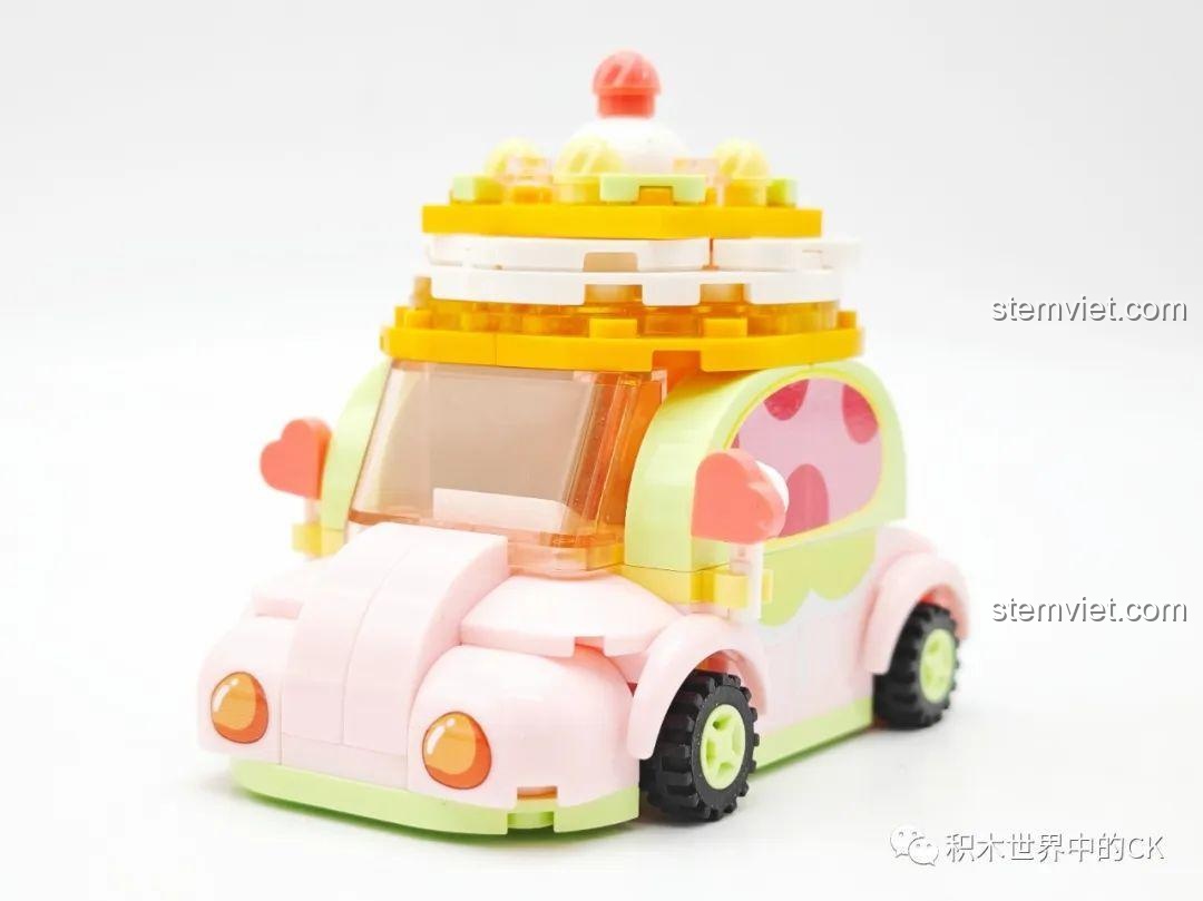 Mô hình xe matcha donut Sembo 615003 đã hoàn thành, với thiết kế hình bánh donut và màu hồng xanh lá.