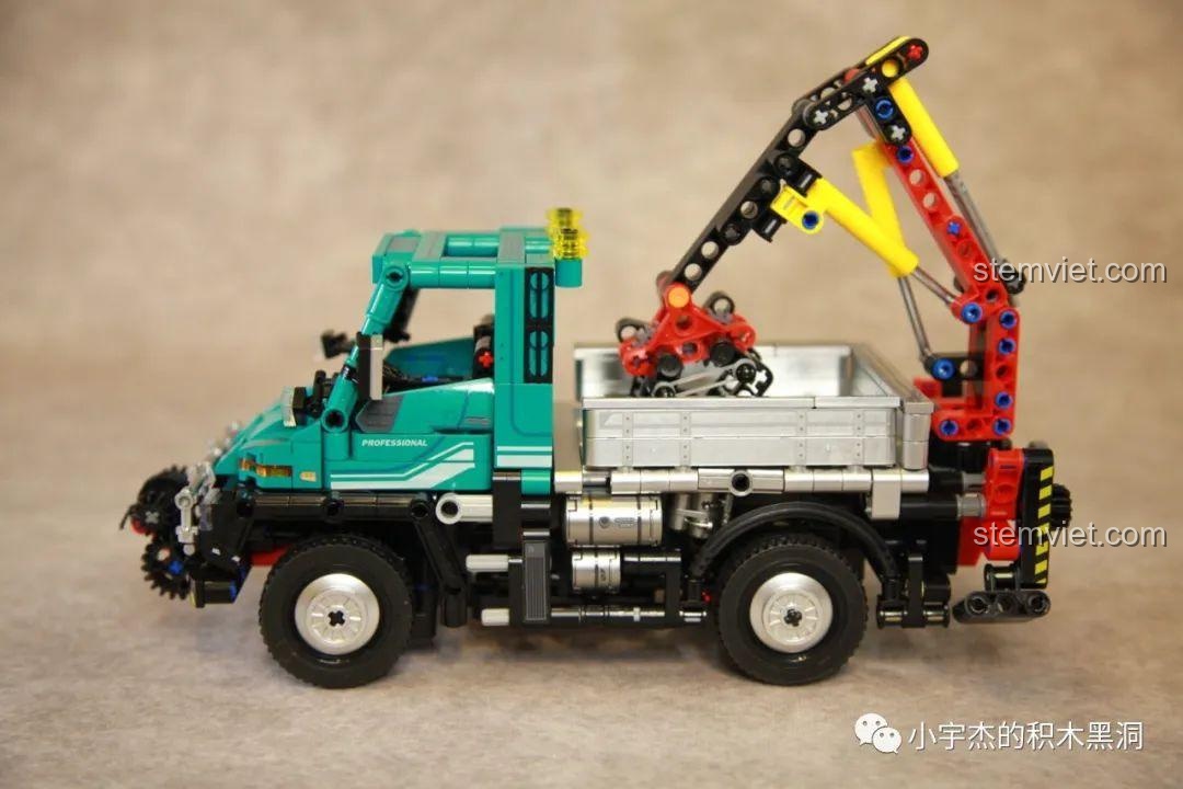 Mô hình hoàn chỉnh xe tải vận chuyển gỗ Unimog U400 SEMBO Block 720900, đồ chơi lắp ráp 910 mảnh ghép cho bé trai 6 tuổi