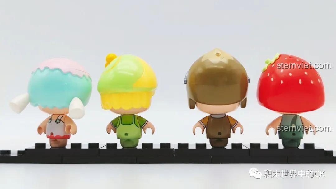 Ảnh chụp phía sau 4 minifigure SEMBO Candy Planet, cho thấy chi tiết trang phục và kiểu tóc. Đồ chơi lắp ghép cho trẻ em.