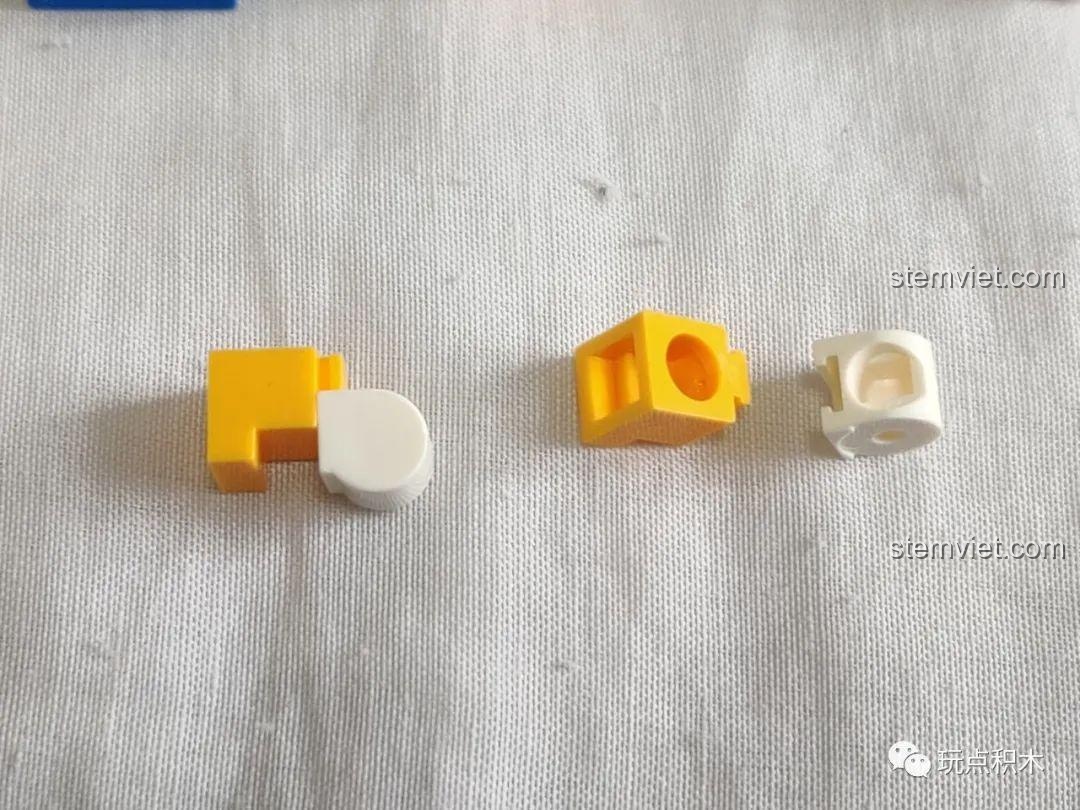 Review vị trí cổng nhựa trên một chi tiết của bộ đồ chơi lắp ghép Xe bán nước giải khát Disney, cho thấy sự tinh tế trong thiết kế khuôn.