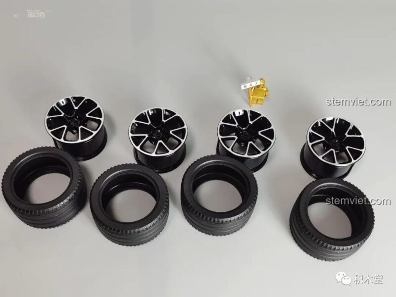 Hai hộp bên trong của bộ lắp ráp Mô hình xe Hồng Kỳ S9 Tegao, với hình vẽ phác thảo của xe.