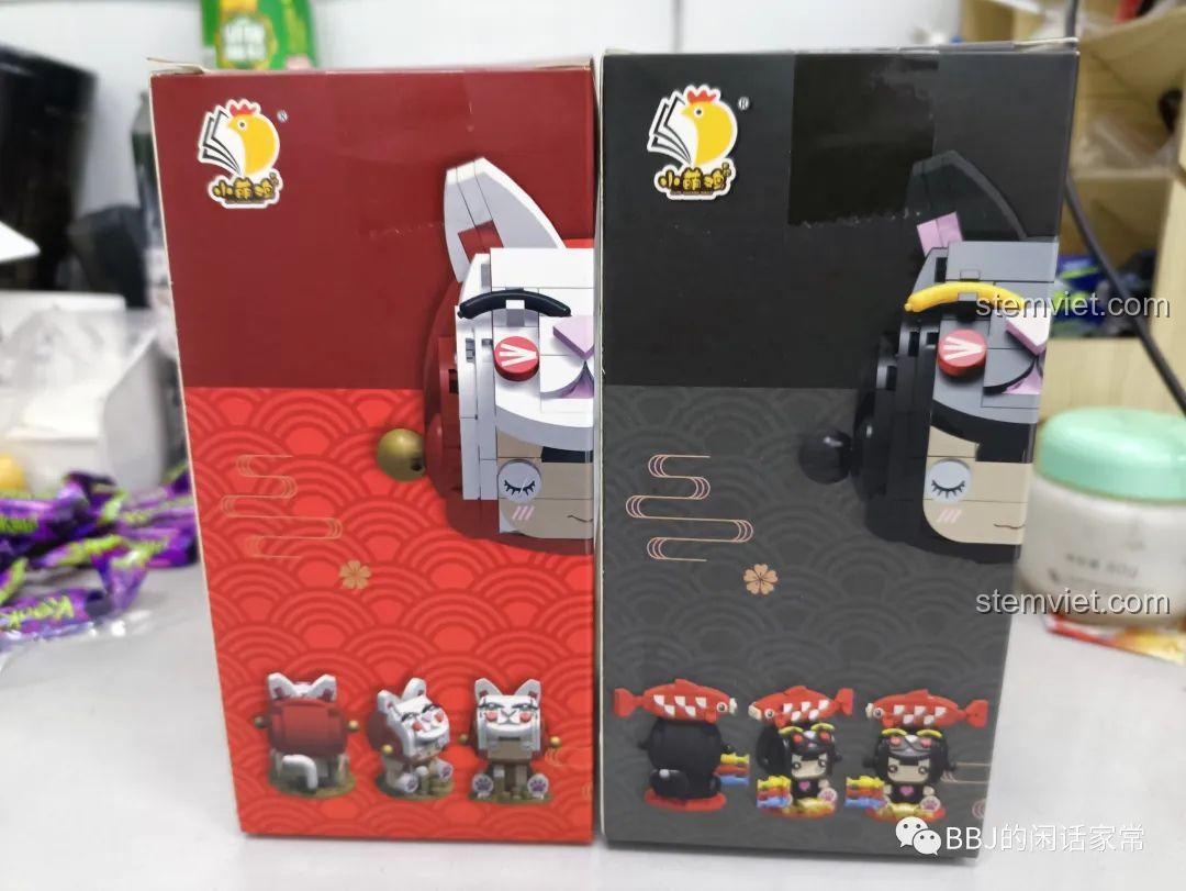 Cạnh bên của hộp đồ chơi lắp ráp Mèo Thần Tài 2054 và 2053, cho thấy hình ảnh mô hình hoàn chỉnh.