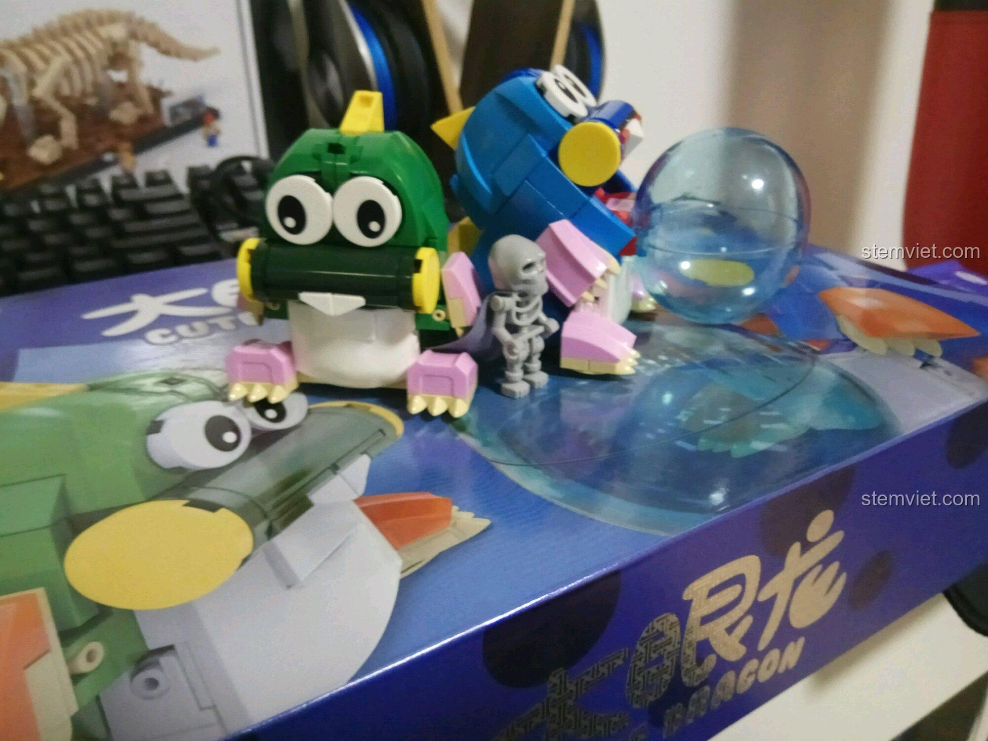Cận cảnh mô hình rồng xanh dương Bob từ game Bubble Bobble, mã XB11001, với chi tiết mắt to đáng yêu.