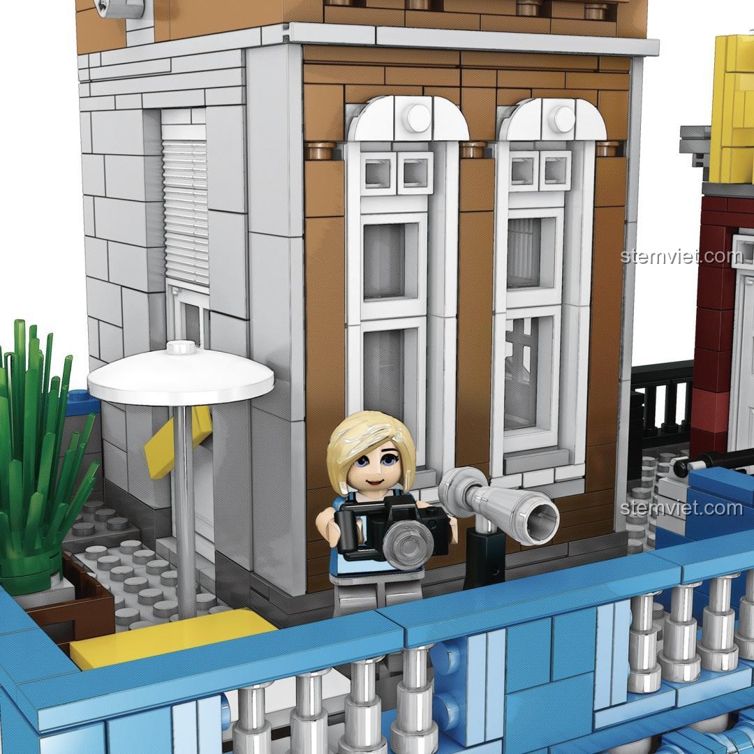 Cận cảnh ban công và minifigure nữ nhiếp ảnh gia trên sân thượng của bộ lắp ráp Zhegao 00956.